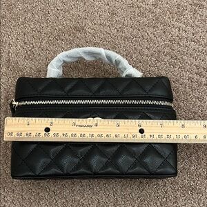 Elegant Black Quilted Handbag